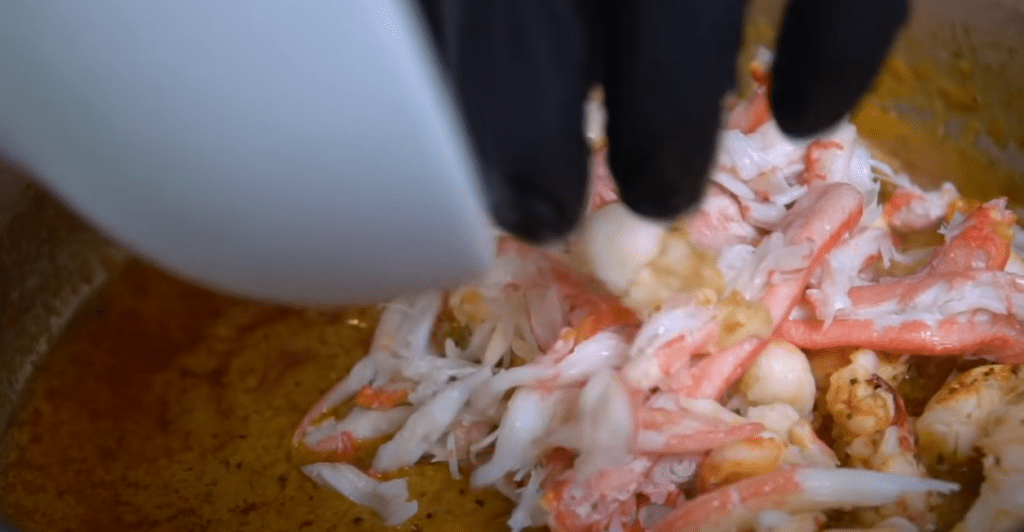 Crab & Lobster Rolls preparation in juicy sauce